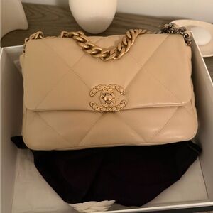 Chanel 19 in beige size medium! Great condition!